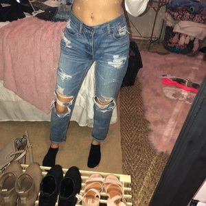 American Eagle ripped mom jeans w the butt cut out